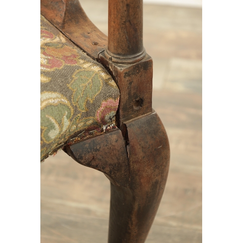 1221 - AN EARLY 18TH CENTURY WALNUT CORNER CHAIR with shaped back and tapering back splats, above a tapestr... 