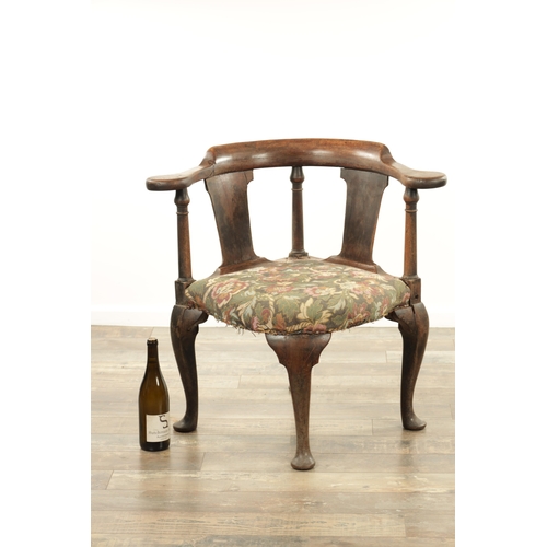 1221 - AN EARLY 18TH CENTURY WALNUT CORNER CHAIR with shaped back and tapering back splats, above a tapestr... 