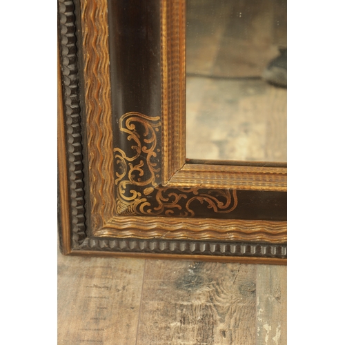 1222 - A MATCHED PAIR OF 18TH CENTURY CONTINENTAL EBONISED AND GILT PAINTED HANGING MIRRORS with cushion fr... 