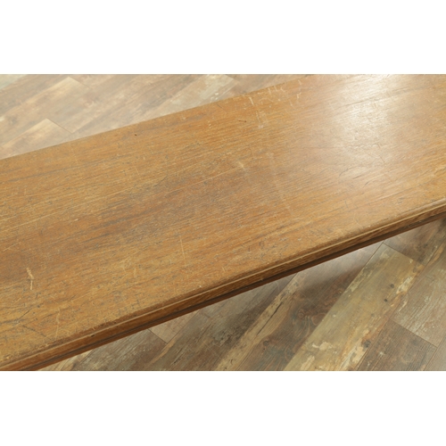 1223 - A PAIR OF LARGE OAK HALL BENCHES IN THE MANNER OF HOLLAND AND SON raised on square tapering legs joi... 