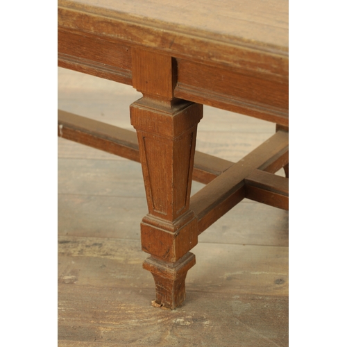 1223 - A PAIR OF LARGE OAK HALL BENCHES IN THE MANNER OF HOLLAND AND SON raised on square tapering legs joi... 