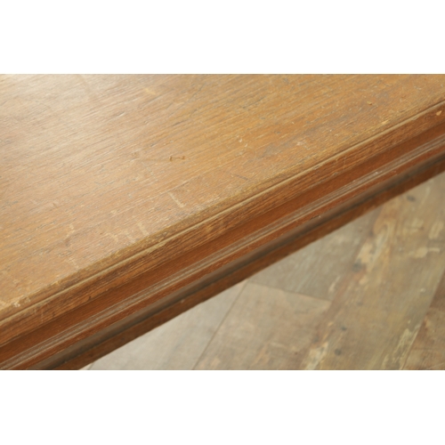 1223 - A PAIR OF LARGE OAK HALL BENCHES IN THE MANNER OF HOLLAND AND SON raised on square tapering legs joi... 