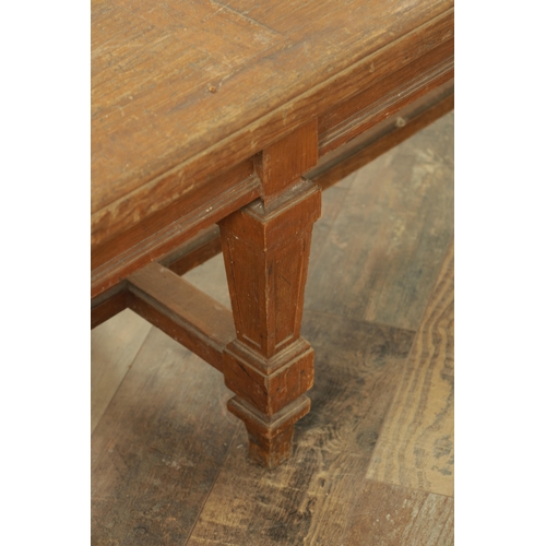 1223 - A PAIR OF LARGE OAK HALL BENCHES IN THE MANNER OF HOLLAND AND SON raised on square tapering legs joi... 