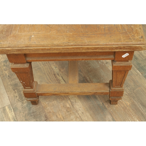 1223 - A PAIR OF LARGE OAK HALL BENCHES IN THE MANNER OF HOLLAND AND SON raised on square tapering legs joi... 