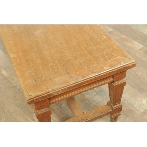 1223 - A PAIR OF LARGE OAK HALL BENCHES IN THE MANNER OF HOLLAND AND SON raised on square tapering legs joi... 