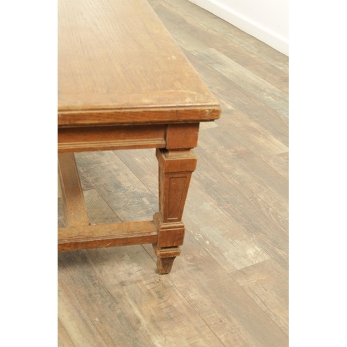 1223 - A PAIR OF LARGE OAK HALL BENCHES IN THE MANNER OF HOLLAND AND SON raised on square tapering legs joi... 