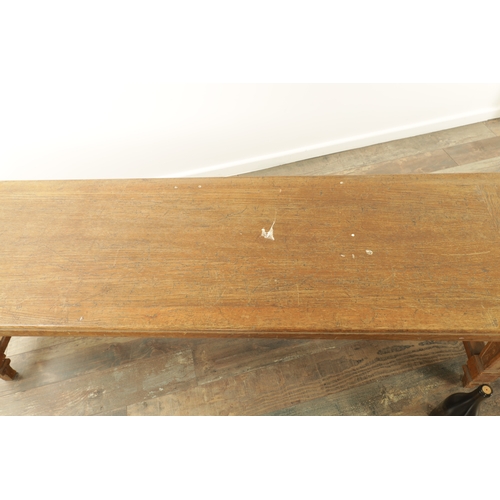 1223 - A PAIR OF LARGE OAK HALL BENCHES IN THE MANNER OF HOLLAND AND SON raised on square tapering legs joi... 