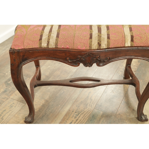 1224 - AN 18TH CENTURY ROSEWOOD ANGLO PORTUGUESE SERPENTINE SHAPED UPHOLSTERED STOOL with moulded edge, sta... 