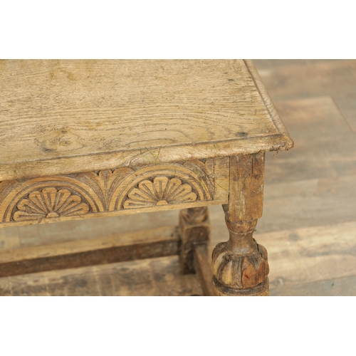 1227 - A 17TH CENTURY STYLE OAK LONG JOINT STOOL with an arcaded carved frieze above bulbous turned legs jo... 