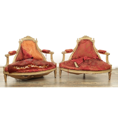 1229 - A PAIR OF 18TH CENTURY CARVED GILT WOOD FRENCH CORNER SALOON CHAIRS with leaf carved and scrolled fr... 