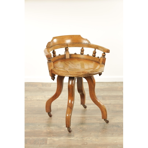 1231 - AN UNUSUAL LATE 19TH CENTURY AESTHETIC PERIOD ELM REVOLVING DESK CHAIR with arcaded decoration. (59c... 