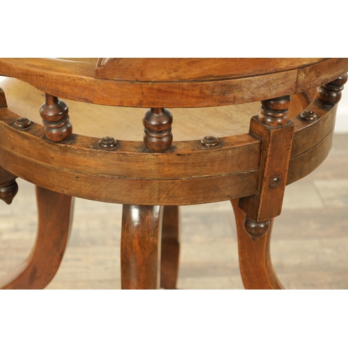 1231 - AN UNUSUAL LATE 19TH CENTURY AESTHETIC PERIOD ELM REVOLVING DESK CHAIR with arcaded decoration. (59c... 