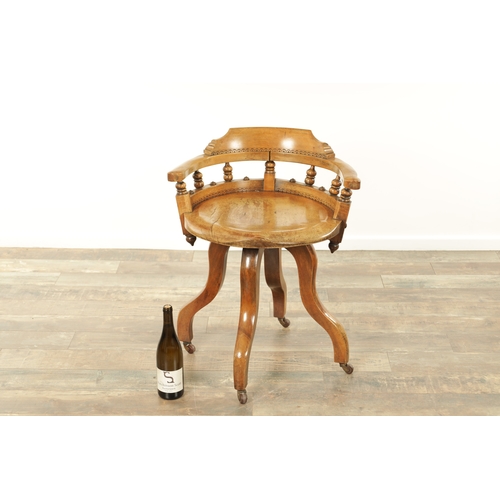 1231 - AN UNUSUAL LATE 19TH CENTURY AESTHETIC PERIOD ELM REVOLVING DESK CHAIR with arcaded decoration. (59c... 