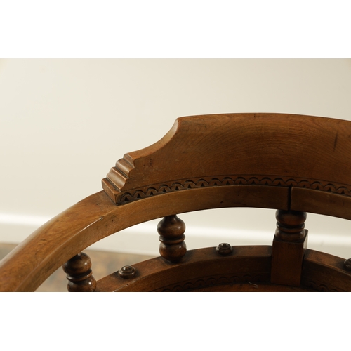 1231 - AN UNUSUAL LATE 19TH CENTURY AESTHETIC PERIOD ELM REVOLVING DESK CHAIR with arcaded decoration. (59c... 