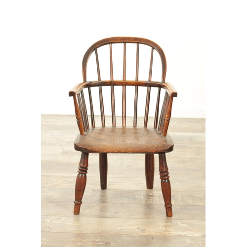 1233 - A 19TH CENTURY CHILD'S STICK-BACK WINDSOR CHAIR having an elm seat and ring-turned legs. (57cm high,... 