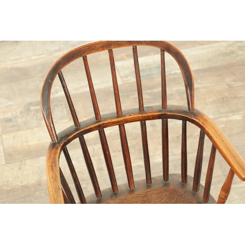 1233 - A 19TH CENTURY CHILD'S STICK-BACK WINDSOR CHAIR having an elm seat and ring-turned legs. (57cm high,... 