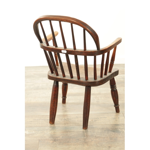 1233 - A 19TH CENTURY CHILD'S STICK-BACK WINDSOR CHAIR having an elm seat and ring-turned legs. (57cm high,... 