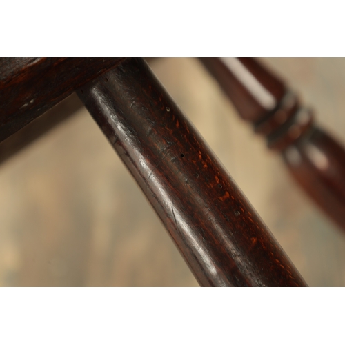 1233 - A 19TH CENTURY CHILD'S STICK-BACK WINDSOR CHAIR having an elm seat and ring-turned legs. (57cm high,... 