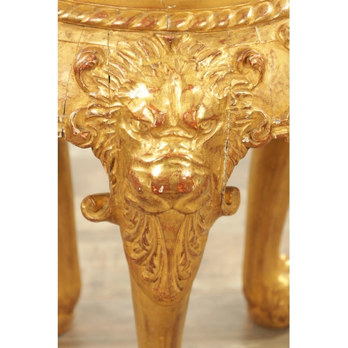 1234 - AN 18TH CENTURY CARVED GILTWOOD JARDINIERE STAND with lion head and shell carved frieze raised on pa... 