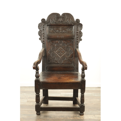 1237 - A GOOD LATE 17TH CENTURY JOINED OAK WAINSCOT CHAIR with scrolled leaf-carved crest and matching ears... 