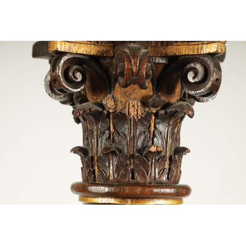 1238 - A PAIR OF 19TH CENTURY OAK AND GILT HIGH-LIGHTED CARVED CORINTHIAN COLUMNS the lower bodies with con... 