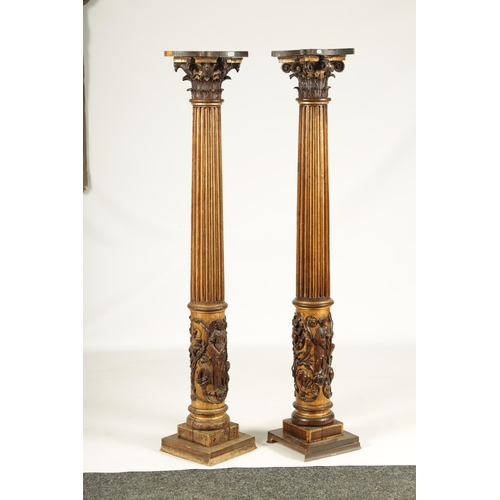 1238 - A PAIR OF 19TH CENTURY OAK AND GILT HIGH-LIGHTED CARVED CORINTHIAN COLUMNS the lower bodies with con... 