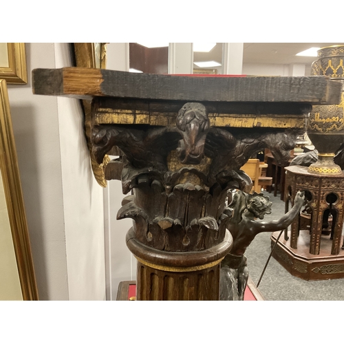 1238 - A PAIR OF 19TH CENTURY OAK AND GILT HIGH-LIGHTED CARVED CORINTHIAN COLUMNS the lower bodies with con... 