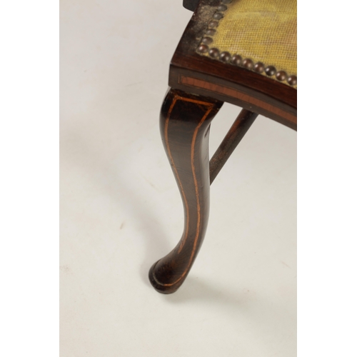 1239 - AN EDWARDIAN INLAID ROSEWOOD ARMCHAIR WITH TAPESTRY UPHOLSTERY the raised oval back with leaf carved... 