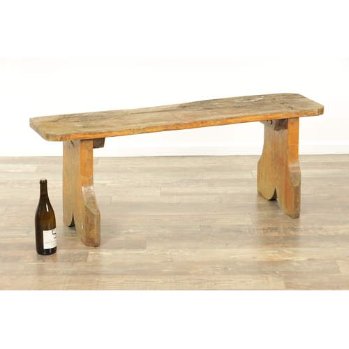 1240 - A PAIR OF 20TH CENTURY OAK BENCHES with shaped plank tops and end supports. (123cm wide 46cm high )