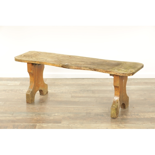 1240 - A PAIR OF 20TH CENTURY OAK BENCHES with shaped plank tops and end supports. (123cm wide 46cm high )