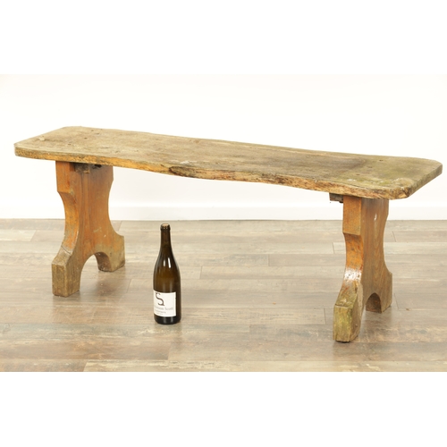 1240 - A PAIR OF 20TH CENTURY OAK BENCHES with shaped plank tops and end supports. (123cm wide 46cm high )