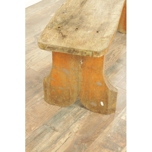 1240 - A PAIR OF 20TH CENTURY OAK BENCHES with shaped plank tops and end supports. (123cm wide 46cm high )