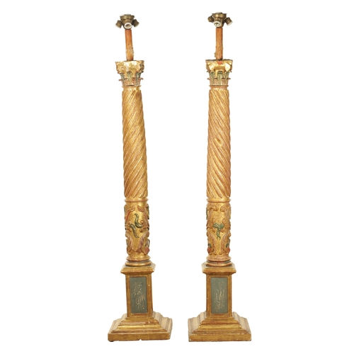 1241 - A PAIR OF EARLY 19TH CENTURY OAK POLYCHROME AND GILT HIGH-LIGHTED CARVED CORINTHIAN COLUMNS with bar... 