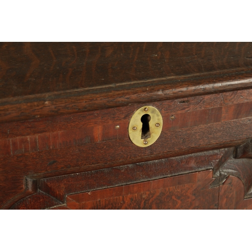 1251 - AN EARLY 18TH CENTURY JOINED OAK MULE CHEST with hinged top and three fielded panels to the front ab... 