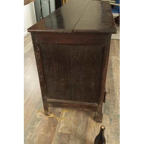 1251 - AN EARLY 18TH CENTURY JOINED OAK MULE CHEST with hinged top and three fielded panels to the front ab... 