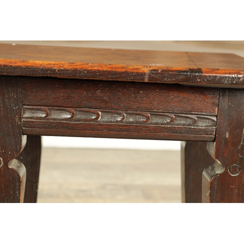 1253 - A 17TH CENTURY STYLE JOINED OAK JOINT STOOL with plank top and chip-carved frieze, raised on silhoue... 