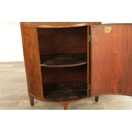 1254 - A GEORGE III DEMI LUNE FIGURED MAHOGANY SIDE CUPBOARD with cross-banded top above a hinged door with... 