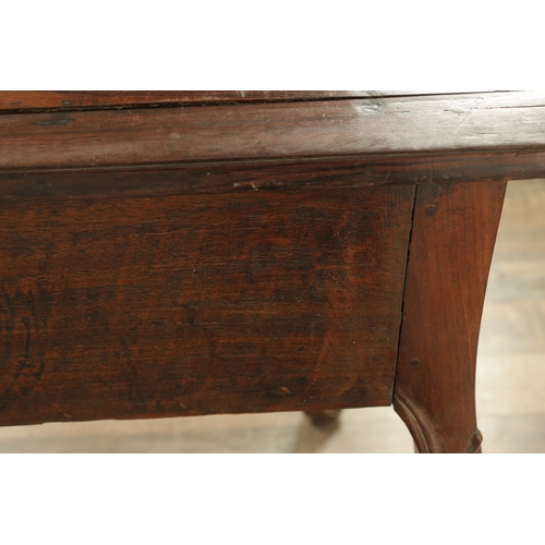 1255 - AN 18TH CENTURY ROSEWOOD ANGLO-PORTUGUESE SERPENTINE-SHAPED SIDE TABLE with moulded edge top above a... 