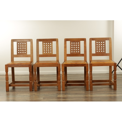 1259 - A SET OF FOUR ROBERT ‘MOUSEMAN’ THOMPSON AZED OAK LATTICE BACK DINING CHAIRS with latticework backs ... 