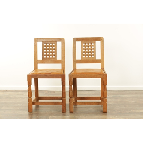 1259 - A SET OF FOUR ROBERT ‘MOUSEMAN’ THOMPSON AZED OAK LATTICE BACK DINING CHAIRS with latticework backs ... 