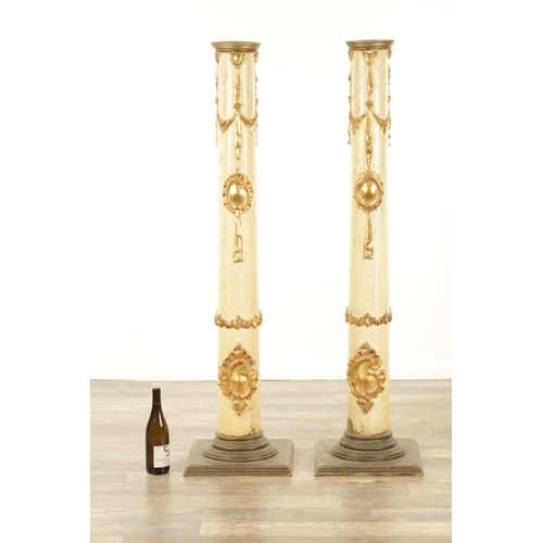 1265 - A PAIR OF 19TH CENTURY CONTINENTAL POLYCHROME AND GILDED WOODEN TORCHERE STANDS on square moulded ba... 