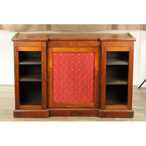 1269 - A LATE REGENCY ROSEWOOD SIDE CABINET with an inverted front having three hinged doors, the centre wi... 