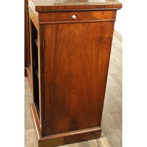 1269 - A LATE REGENCY ROSEWOOD SIDE CABINET with an inverted front having three hinged doors, the centre wi... 