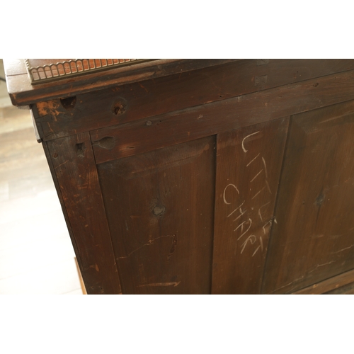 1269 - A LATE REGENCY ROSEWOOD SIDE CABINET with an inverted front having three hinged doors, the centre wi... 