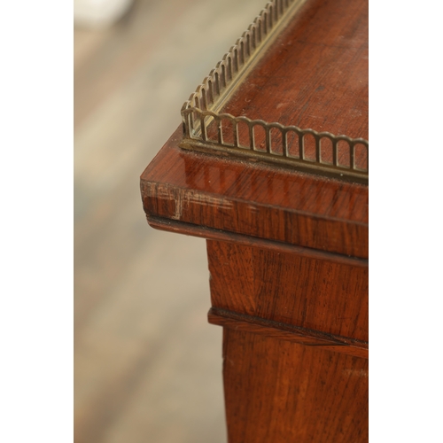 1269 - A LATE REGENCY ROSEWOOD SIDE CABINET with an inverted front having three hinged doors, the centre wi... 