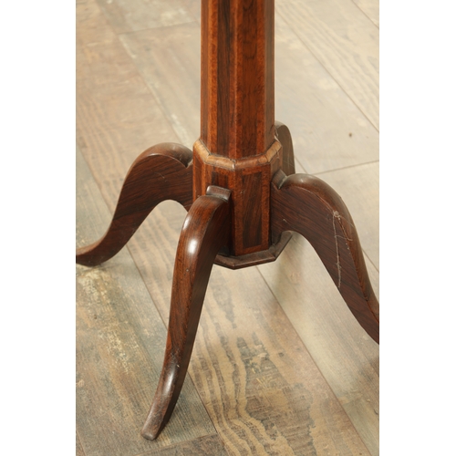 1270 - A REGENCY FIGURED ROSEWOOD SIDE TABLE with two frieze drawers raised on a tapering octagonal stem wi... 