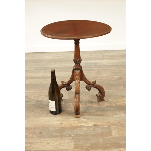 1276 - A LATE 19TH CENTURY MAHOGANY OCCASIONAL TABLE with an inlaid circular top above a leaf-carved tripod... 