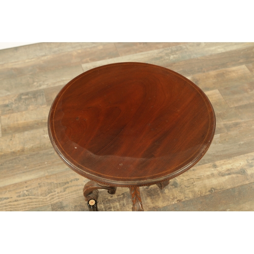 1276 - A LATE 19TH CENTURY MAHOGANY OCCASIONAL TABLE with an inlaid circular top above a leaf-carved tripod... 