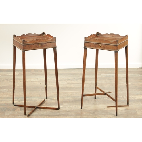 1279 - A PAIR OF GEORGE III STYLE KETTLE STANDS with square tops having shaped galleries above pull-out sli... 