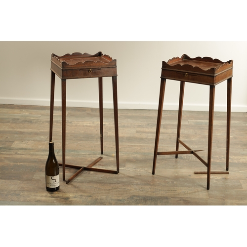 1279 - A PAIR OF GEORGE III STYLE KETTLE STANDS with square tops having shaped galleries above pull-out sli... 